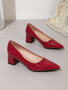 Moncelia burgundy croc-embossed block heel pumps, pair shown from the side, women's sizes 5.5 to 12
