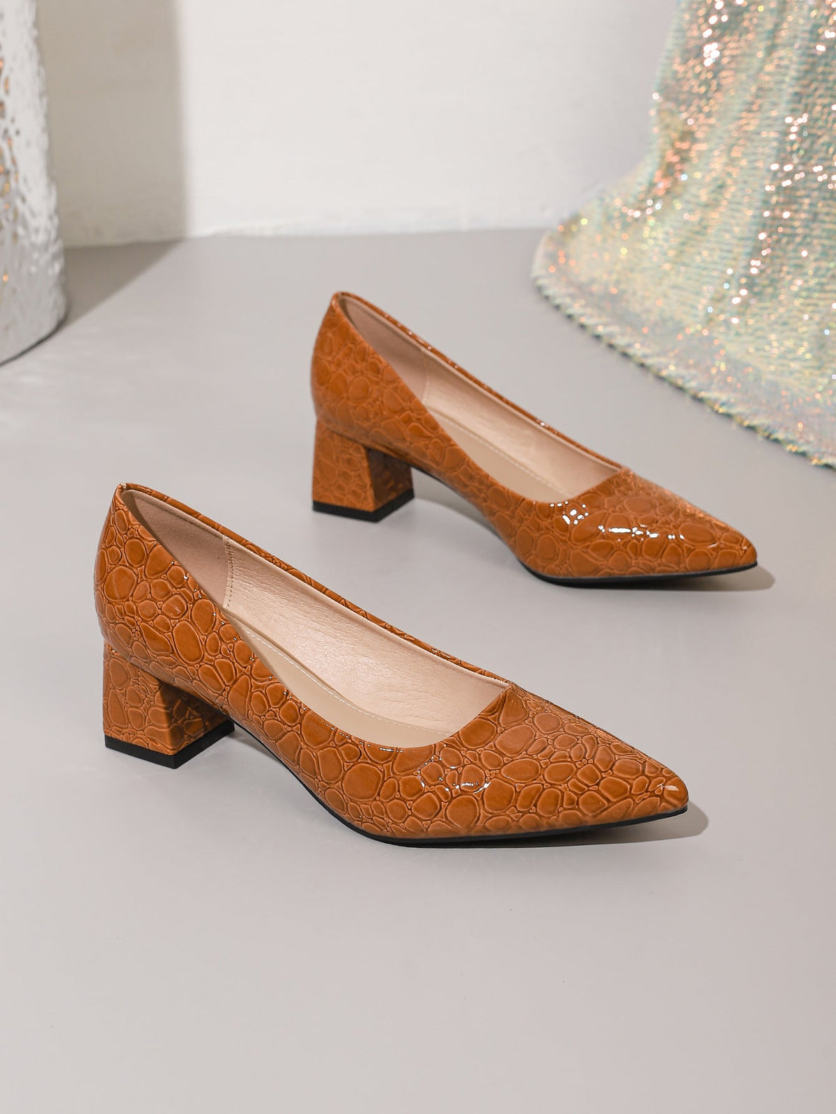 Moncelia brown croc-embossed block heel pumps, pair shown from the side, women's sizes 5.5 to 12