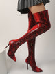 Moncelia red snake print over-the-knee boots, side view showing stiletto heels, women's sizes 5.5 to 9