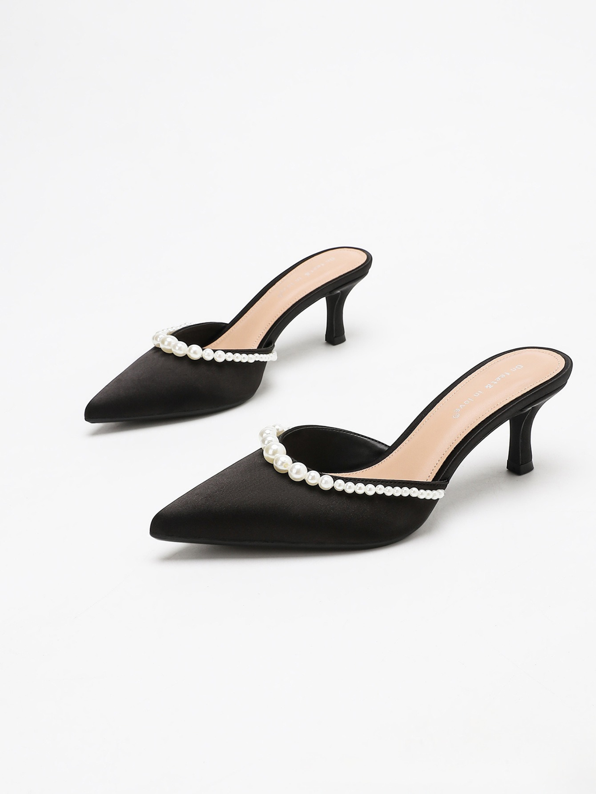 Moncelia black pearl trim satin mules, pair shown from the side, women's sizes 5 to 11.5