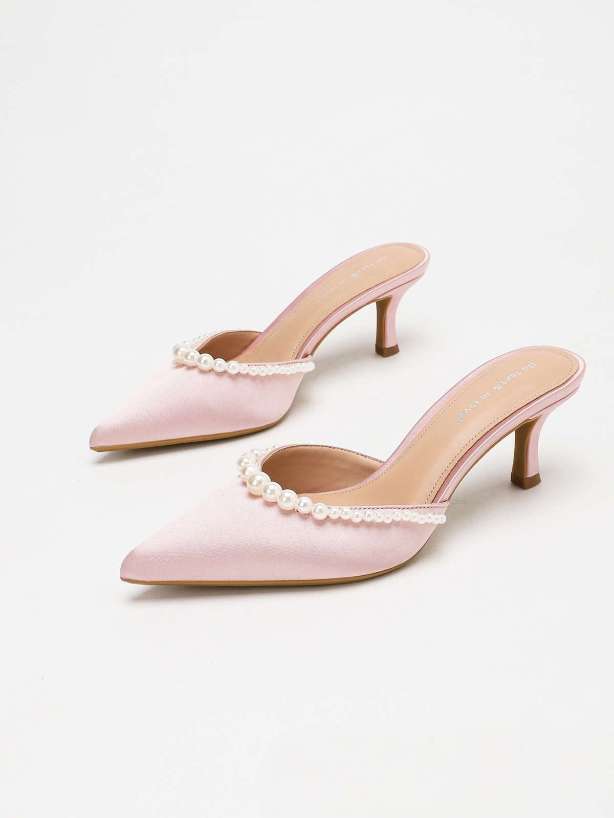 Moncelia pink pearl trim satin mules, pair shown from the side, women's sizes 5 to 11.5