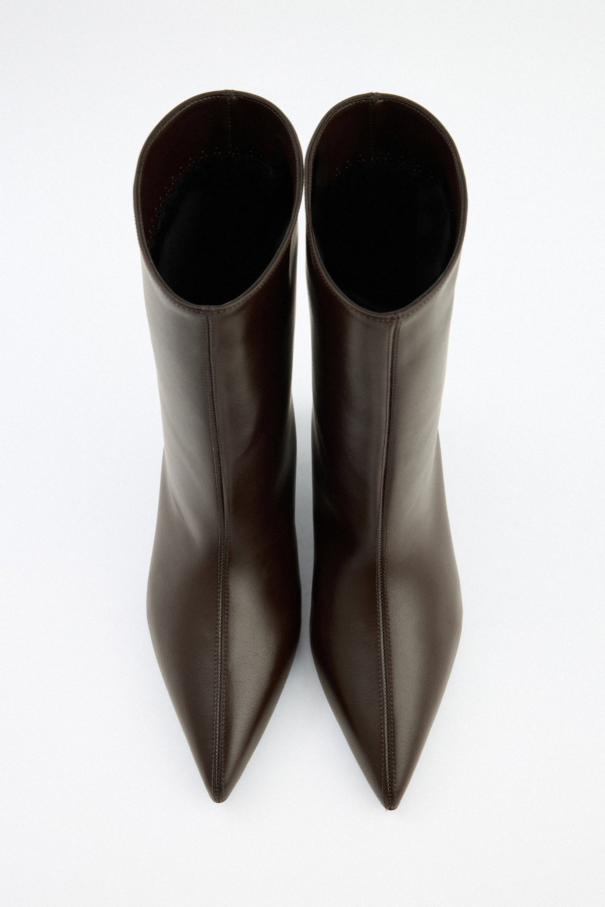 Moncelia brown pointed toe kitten heel booties, pair shown from above, women's sizes 5 to 12