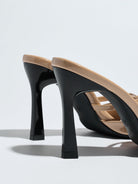 Moncelia apricot bow pointed toe heeled mules, back view showing flared black heels, women's sizes 5 to 12