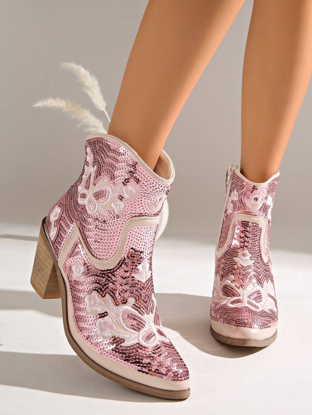 Moncelia pink sequin western ankle boots, on model walking, three-quarter view, women's sizes 5.5 to 12