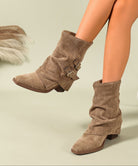 Moncelia olive ruched buckle slouch boots, worn on model showing pointed toe, women's sizes 5.5 to 11