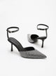 Moncelia black crystal paved pointed toe mules, pair shown from the side, women's sizes 5 to 11.5