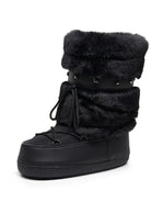 Moncelia black faux fur studded platform snow boots, single boot showing studded strap, women's sizes 5.5 to 9