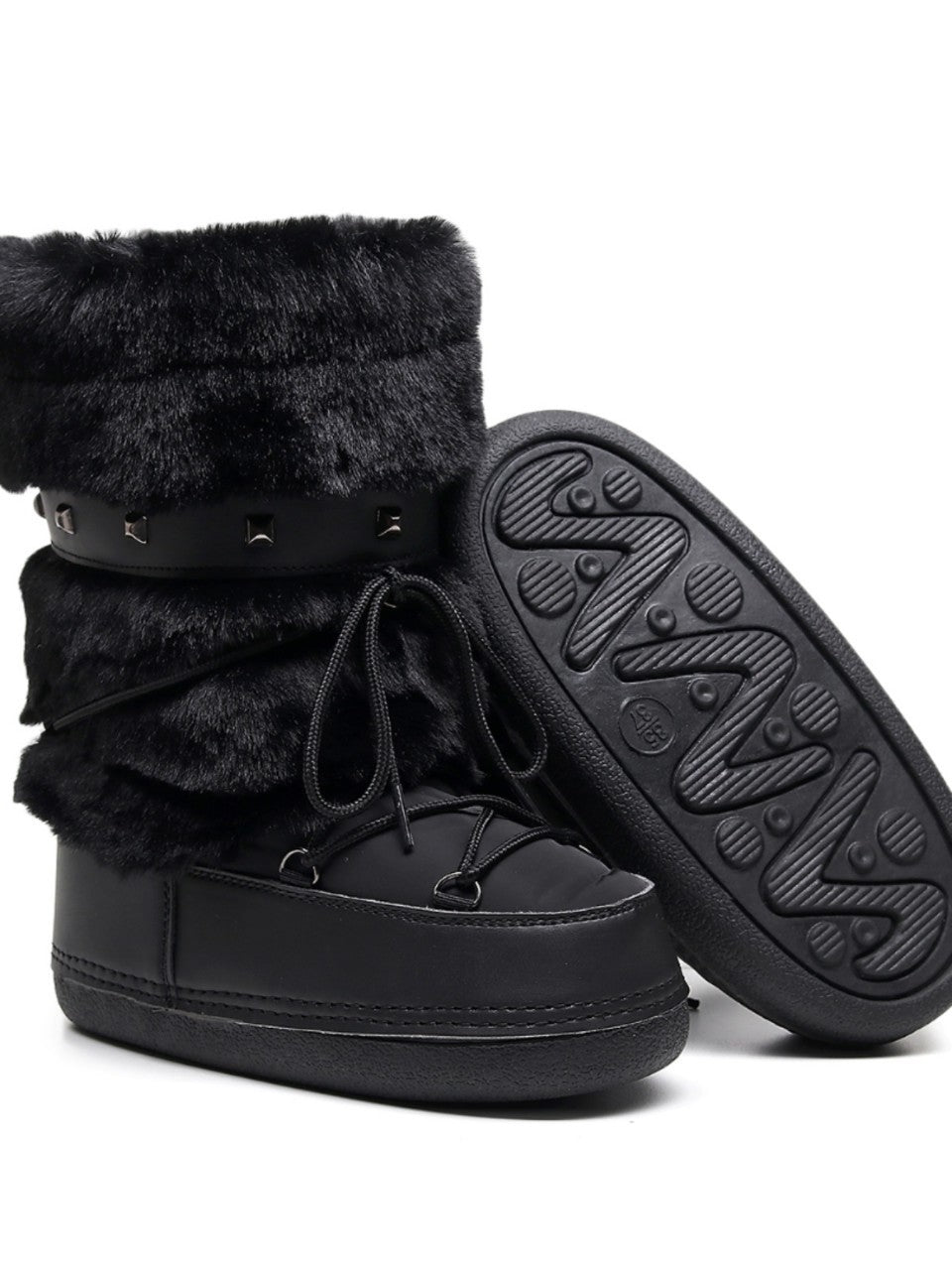 Moncelia black faux fur studded platform snow boots, close-up of lug sole tread, women's sizes 5.5 to 9