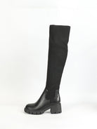 Moncelia black ribbed knit over-the-knee boots, single boot in profile, full shaft, women's sizes 5.5 to 12