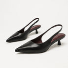 Moncelia black pointed toe slingback spool heels, pair shown from the side, women's sizes 5 to 11.5