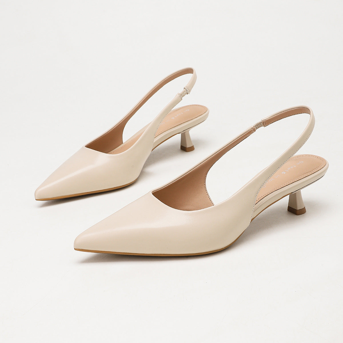 Moncelia apricot pointed toe slingback spool heels, pair shown from the side, women's sizes 5 to 11.5